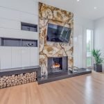 living room with marble fireplace surround