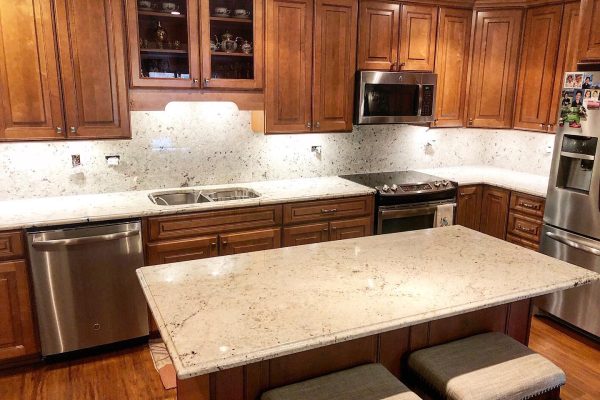 Cotton-White-countertops-_-full-height-backsplash-granite